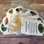 Mike’s Pepper Seeds   Set of garden seed packets on a wooden surface