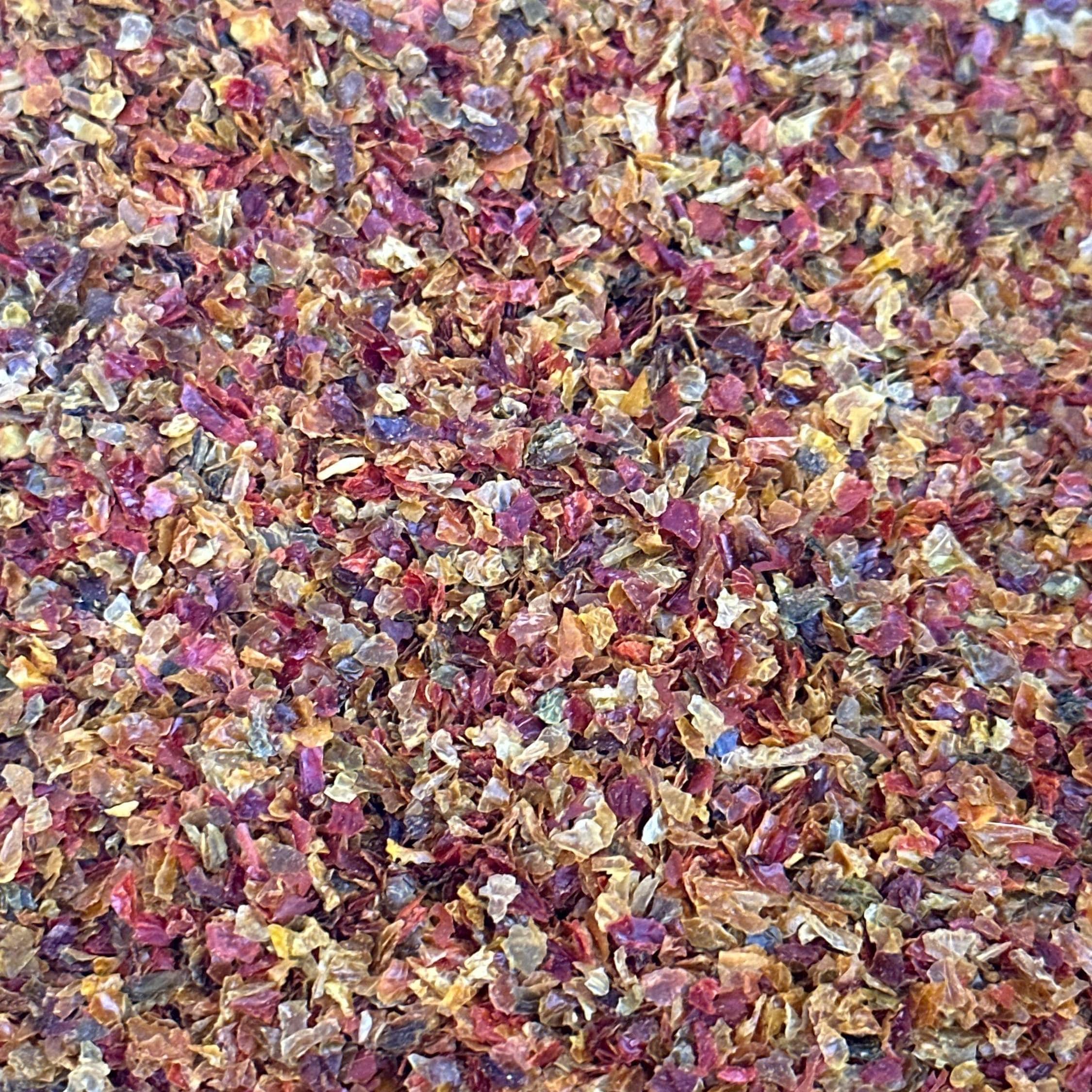 Mike’s Pepper Seeds Multicolored hot  pepper flakes in a close-up shot